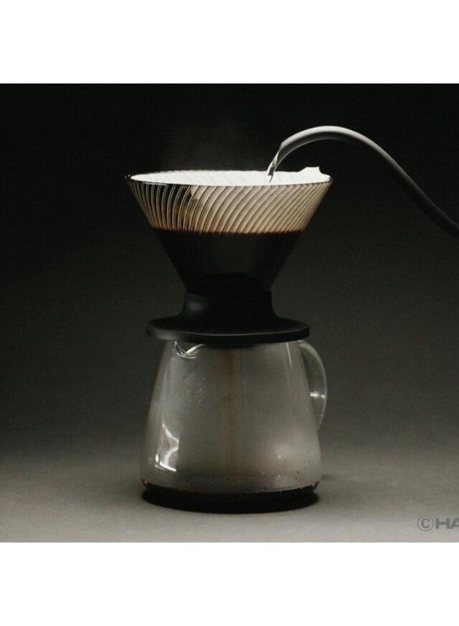 هاريو قمع تقطير القهوة V60 NEO 02، أسود، مقاس 2، سعة 1-2 كوب، سيراميك مقاوم للحرارة، أضلاع حلزونية لتدفق أسرع، أخاديد مائلة، قابل للتكديس، آمن للاستخدام في غسالة الصحون والميكروويف - Image 4